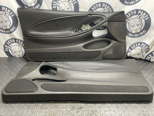 2003-04 Ford Mustang SVT Cobra OEM Door Panels Pair- Dark Charcoal 295