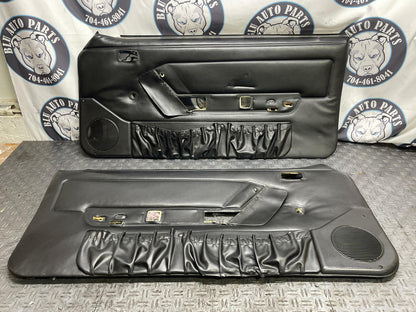 1987-93 Ford Mustang OEM Black Door Panels 304
